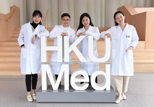 HKUMed discovers a novel mediator of liver fibrosis and its underlying mechanism that can be a new therapeutic target. The research was led by Dr Ruby Hoo Lai-chong (second from left), Assistant Professor, Department of Pharmacology and Pharmacy, HKUMed and Co-investigator of State Key Laboratory of Pharmaceutical Biotechnology, HKU. Dr Wu Xiaoping (second from right), post-doctoral fellow, Department of Pharmacology and Pharmacy, HKUMed is the first author. Other research team members include: Ms Zong Jiuyu (left) and Ms Zhang Zixuan (right), postgraduate student, Department of Pharmacology and Pharmacy, HKUMed.